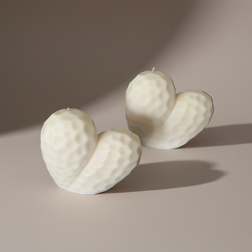 Hand-poured Sculptural Heart pillar candles in soy and beeswax blend by Quality Time Candles, inspired by naturally-formed shapes