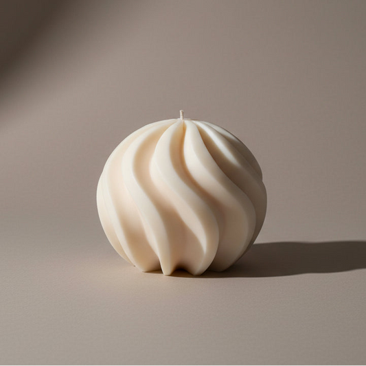 Hand-poured Sculpturaltwirl-swirl-sand dune candle in soy and beeswax blend by Quality Time Candles, inspired by naturally-formed shapes